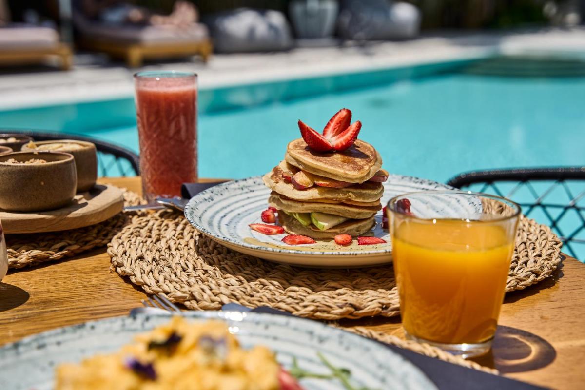 Adorno Beach Hotel and Suites