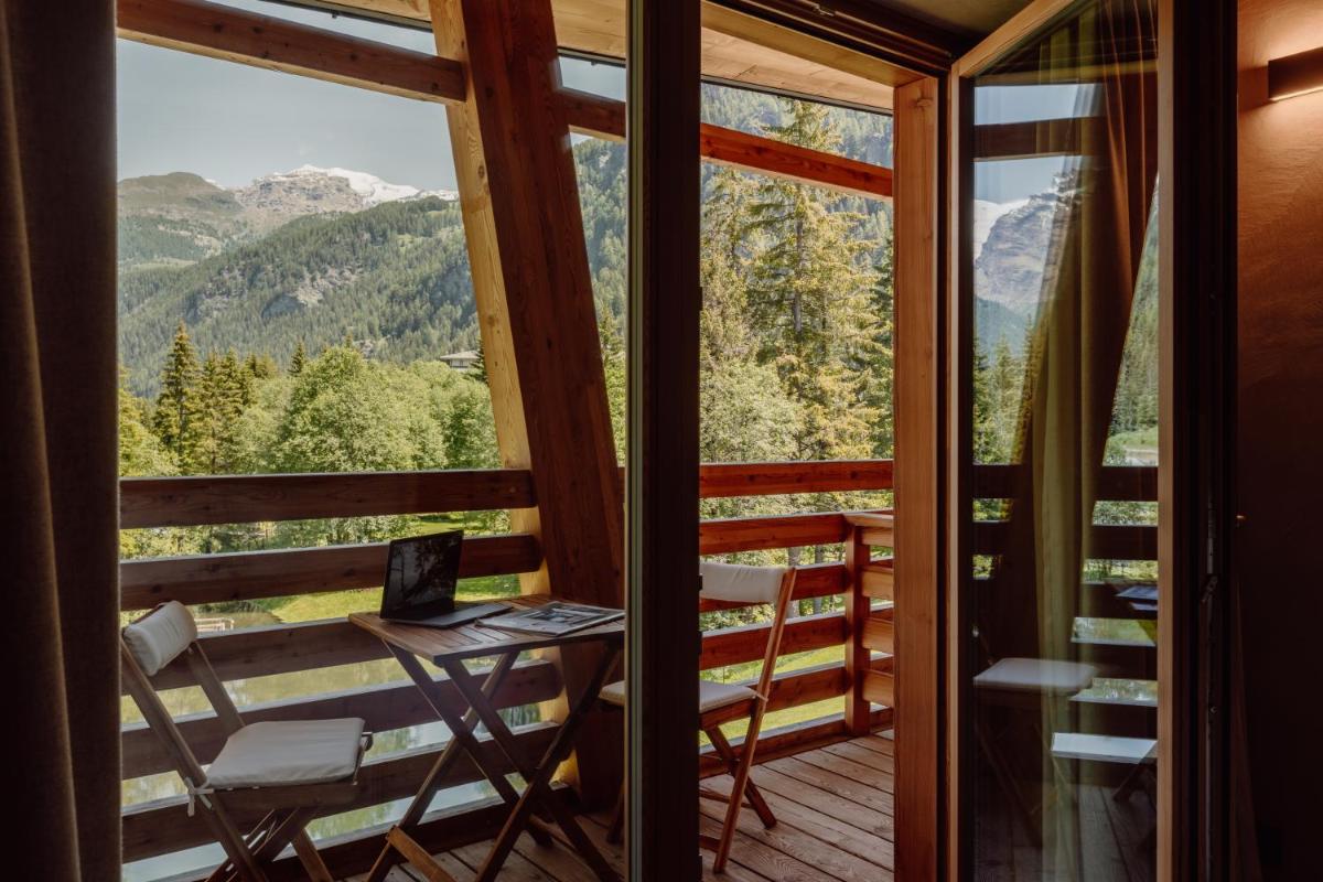 Au Charmant Petit Lac - Ecohotel Parc & Spa