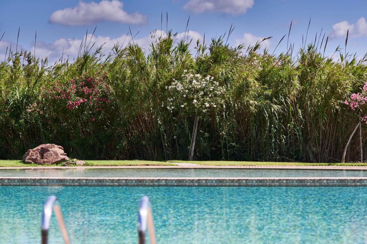 Baia Di Chia Resort Sardinia, Curio Collection By Hilton