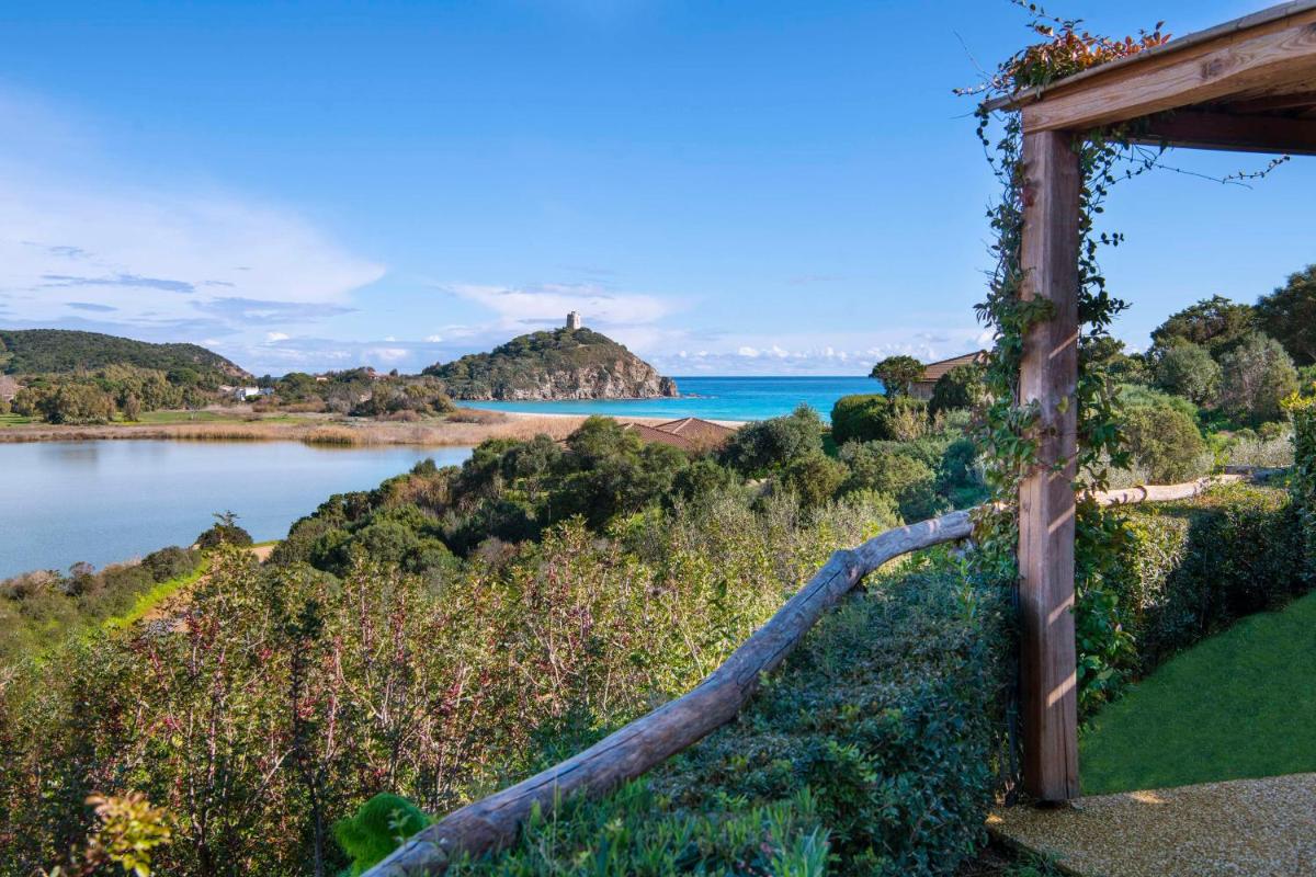 Baia Di Chia Resort Sardinia, Curio Collection By Hilton