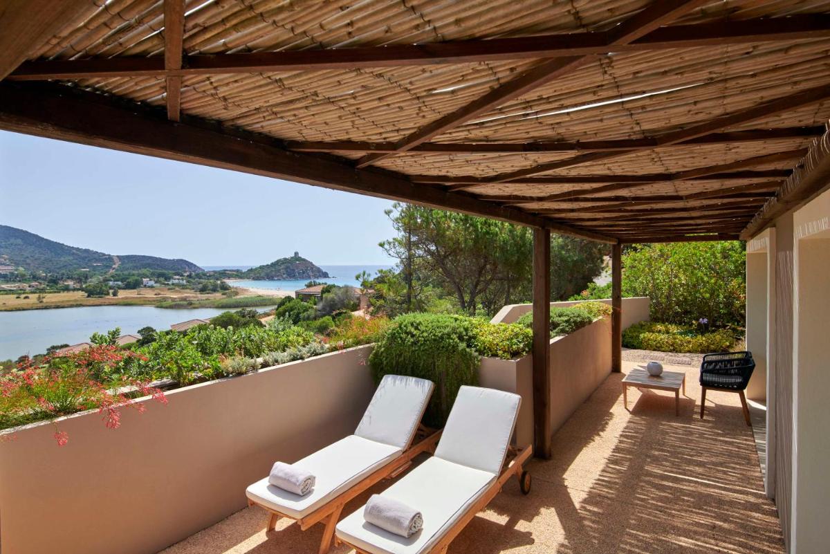 Baia Di Chia Resort Sardinia, Curio Collection By Hilton