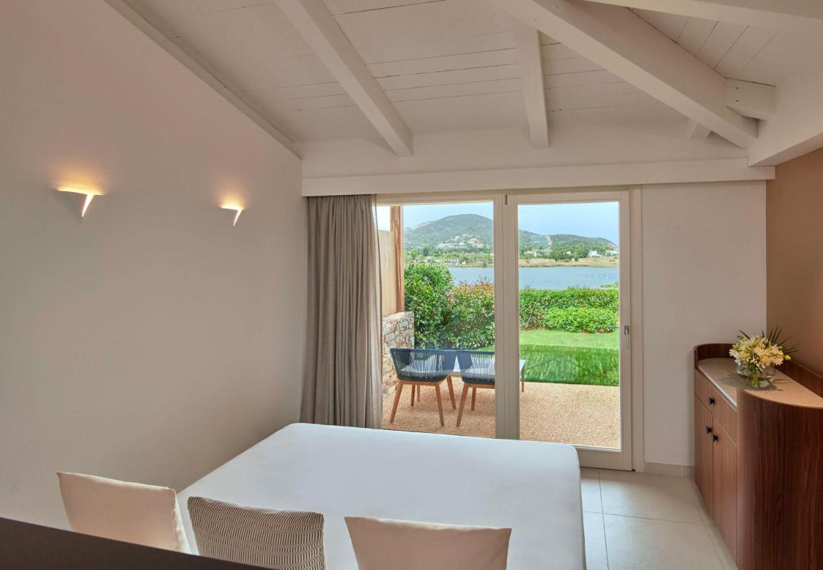 Baia Di Chia Resort Sardinia, Curio Collection By Hilton