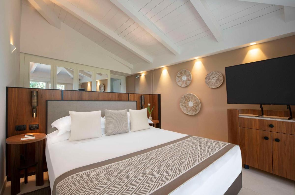 Baia Di Chia Resort Sardinia, Curio Collection By Hilton