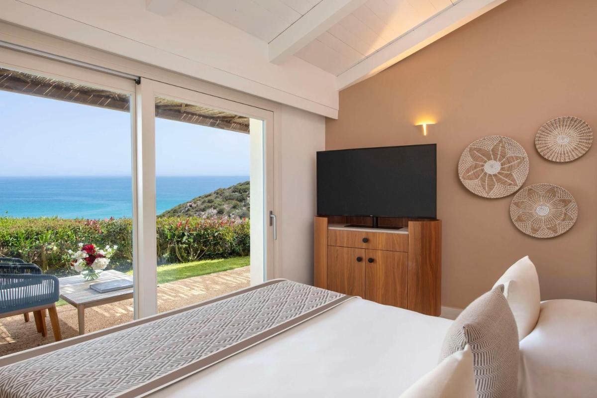 Baia Di Chia Resort Sardinia, Curio Collection By Hilton