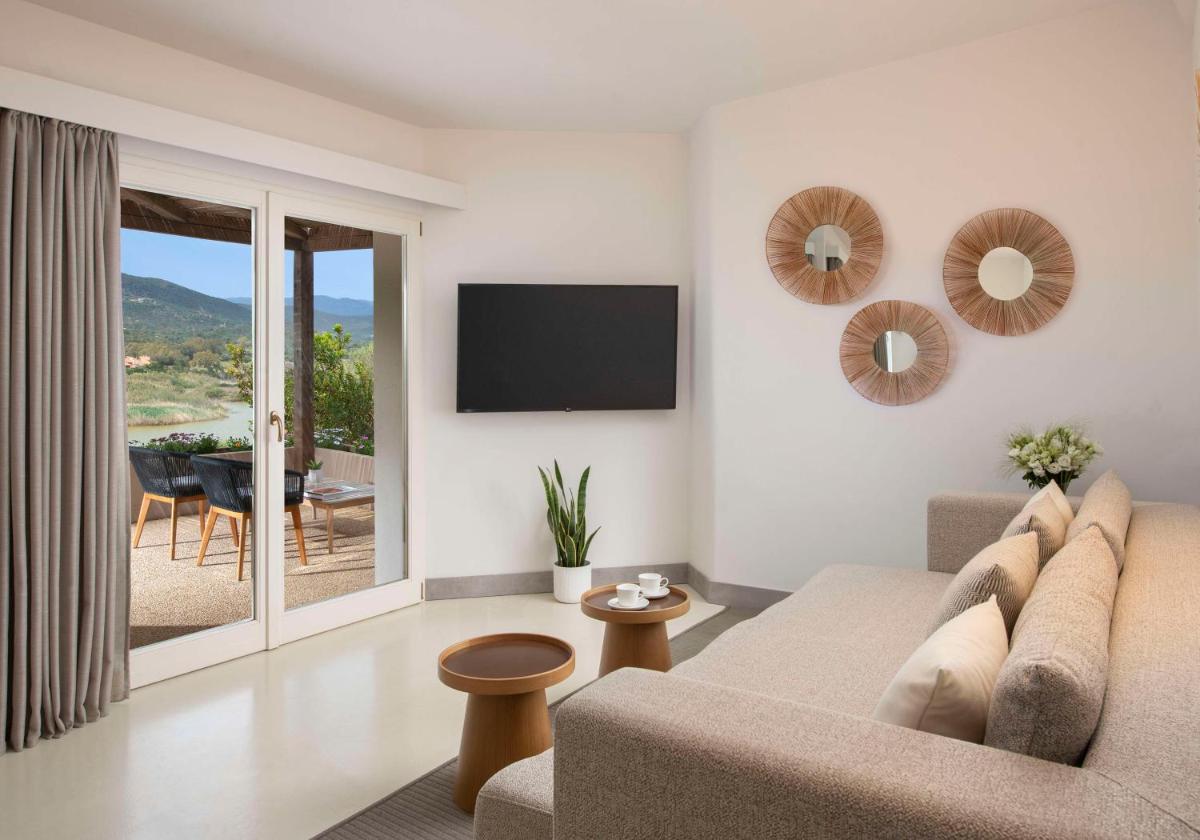 Baia Di Chia Resort Sardinia, Curio Collection By Hilton