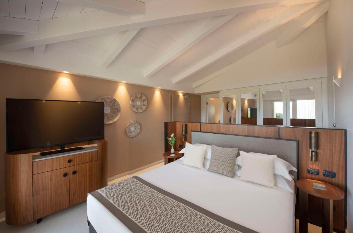 Baia Di Chia Resort Sardinia, Curio Collection By Hilton
