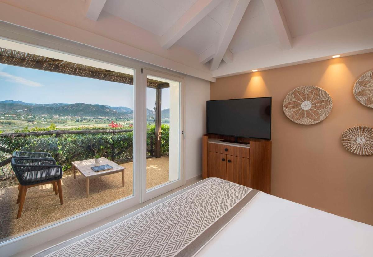 Baia Di Chia Resort Sardinia, Curio Collection By Hilton