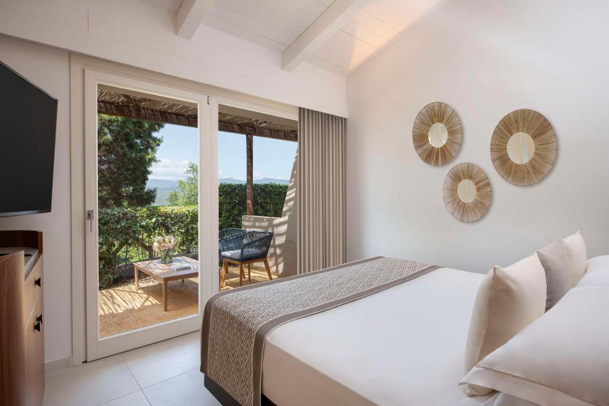 Baia Di Chia Resort Sardinia, Curio Collection By Hilton