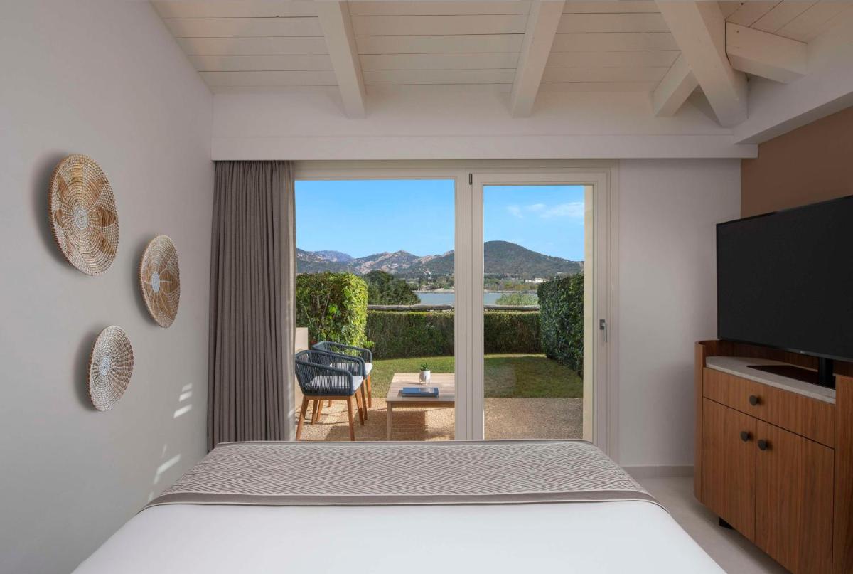Baia Di Chia Resort Sardinia, Curio Collection By Hilton