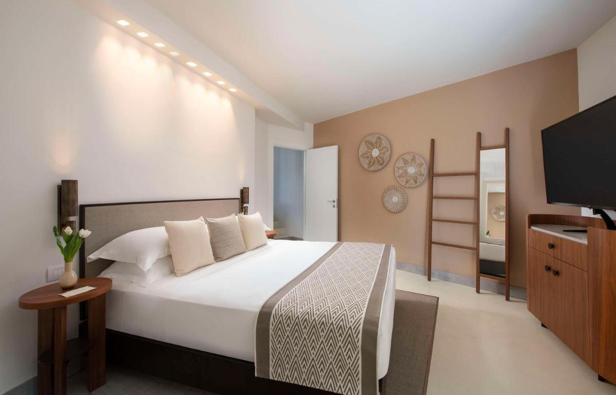 Baia Di Chia Resort Sardinia, Curio Collection By Hilton