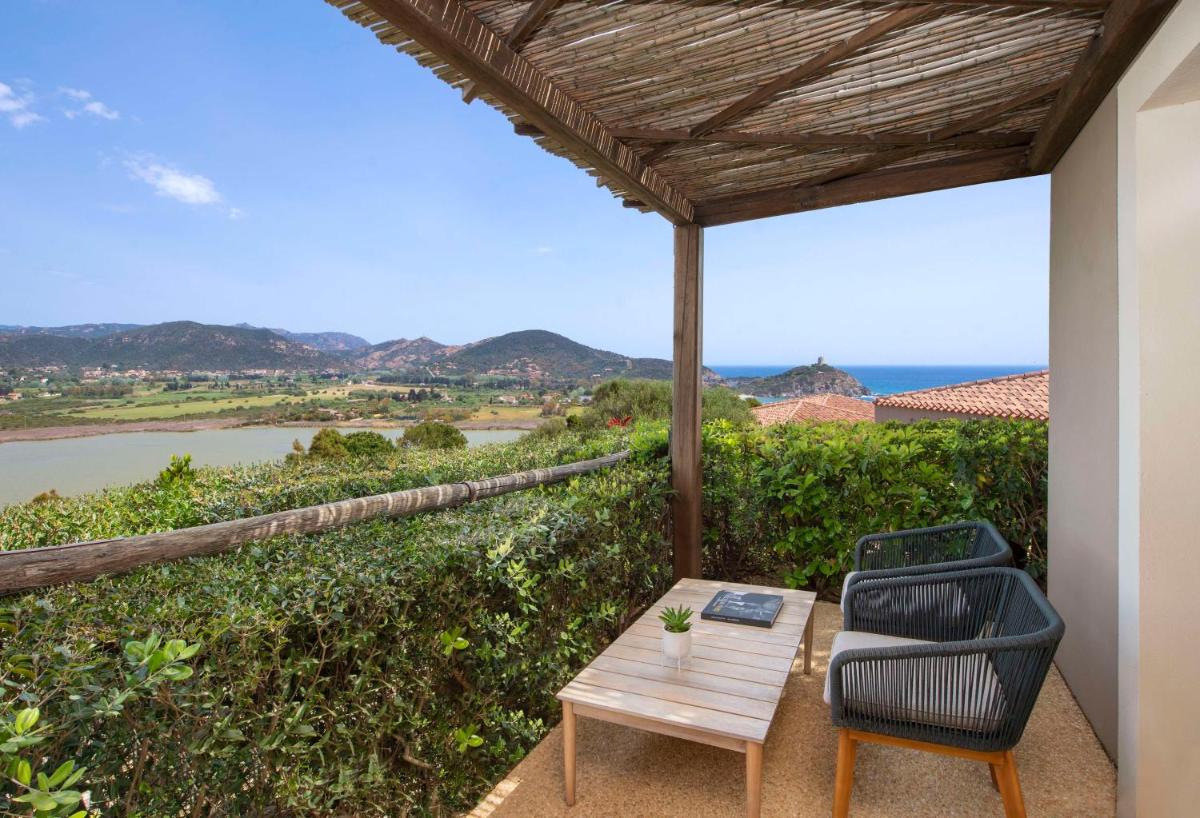 Baia Di Chia Resort Sardinia, Curio Collection By Hilton