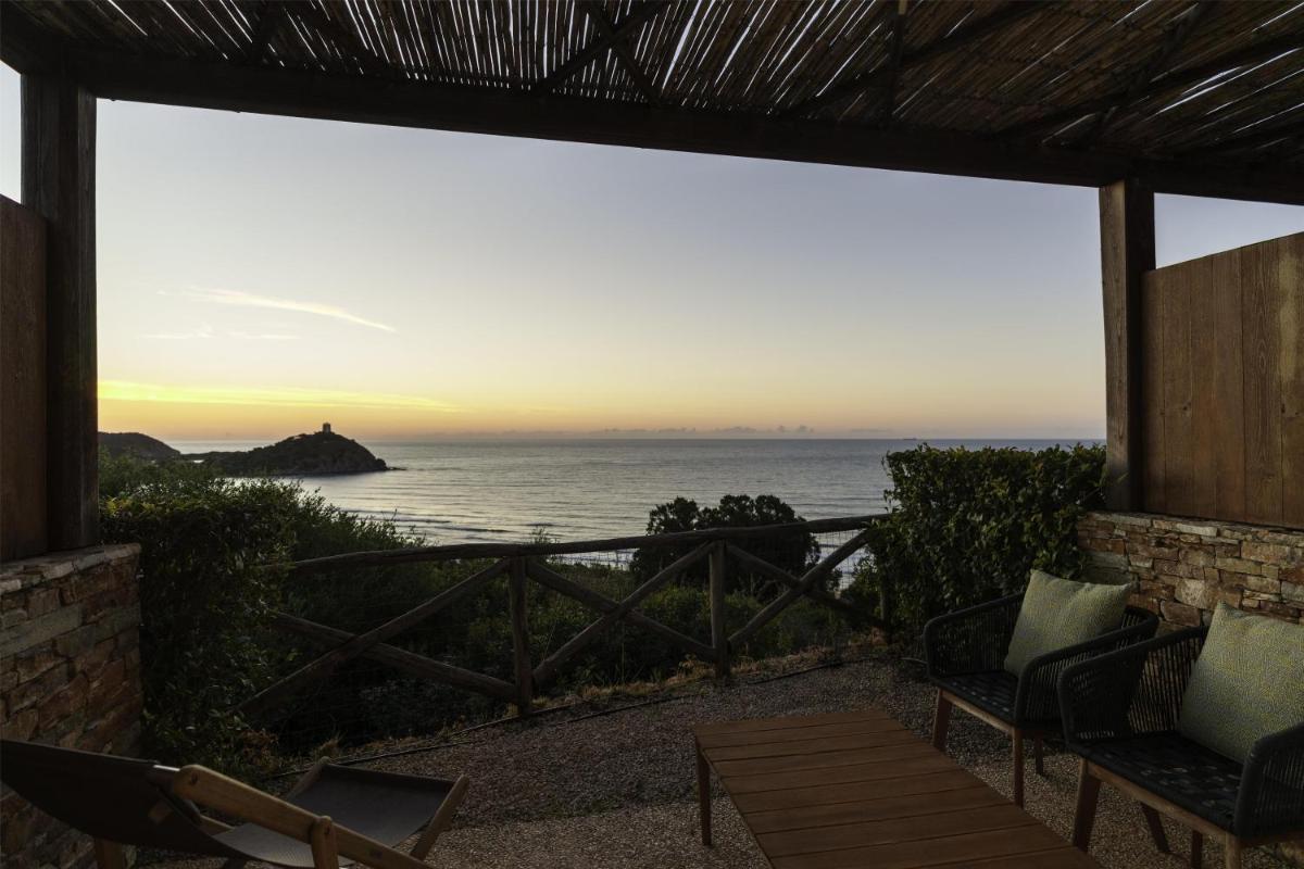 Baia Di Chia Resort Sardinia, Curio Collection By Hilton