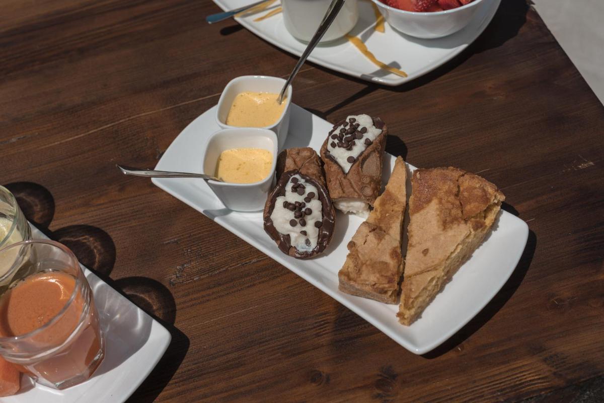 Cala Cala Rooms,Restaurant & Farm Experience