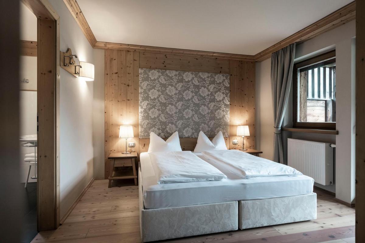 Post Alpina - Family Chalets Dolomites