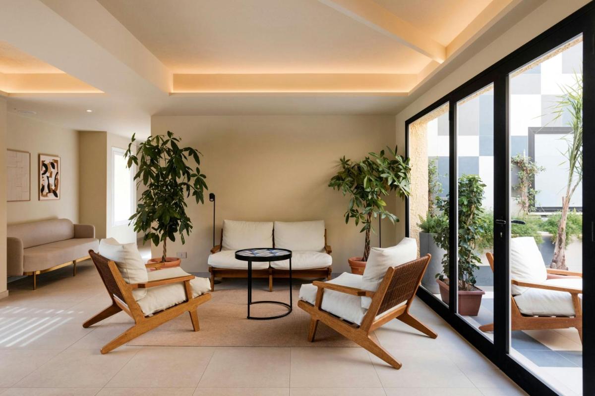 Mangia's Brucoli, Sicily, Autograph Collection