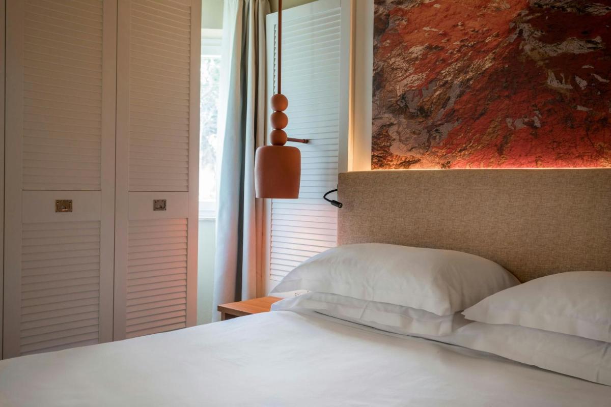 Mangia's Brucoli, Sicily, Autograph Collection