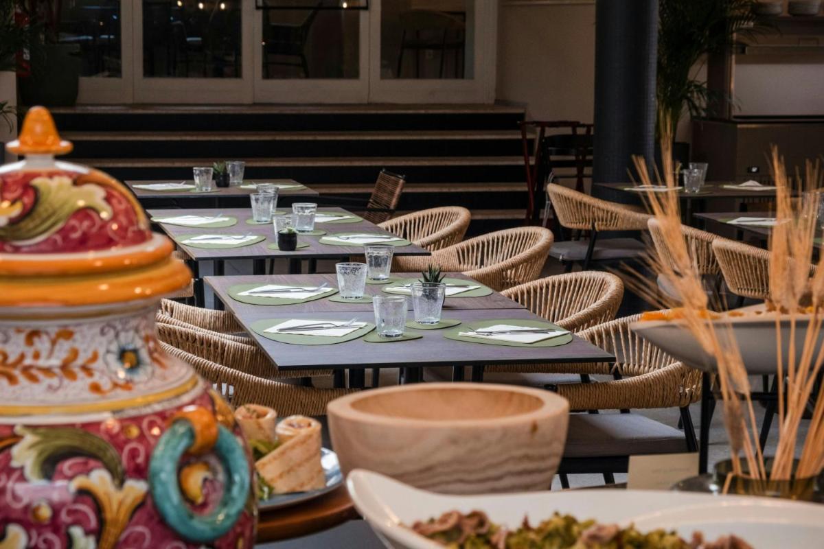 Mangia's Brucoli, Sicily, Autograph Collection