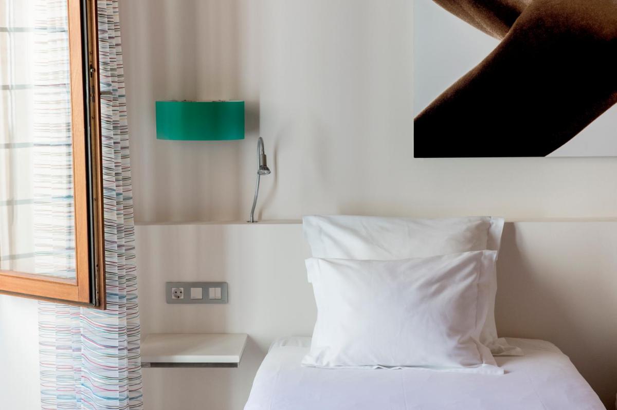 Petit Palace Hotel Tres