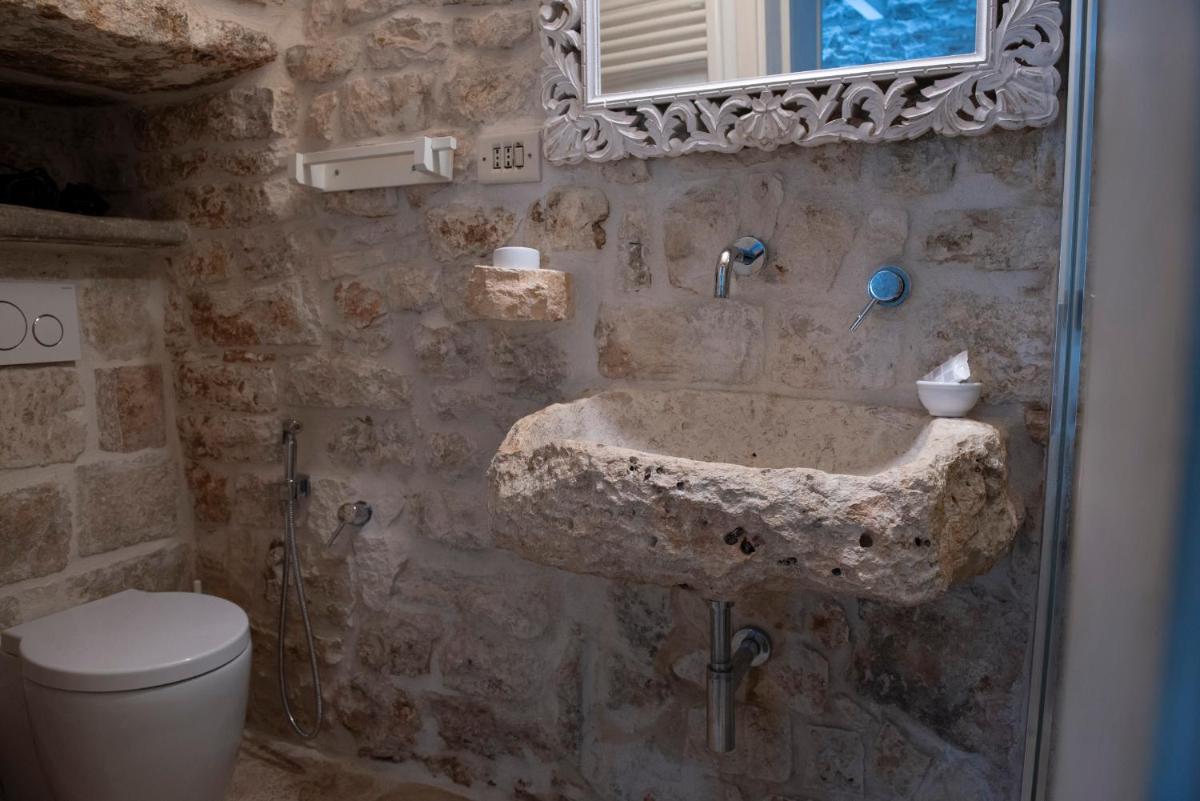 Trulli diffusi de La Corte dell'Astore I Trulli Antichi Mestieri