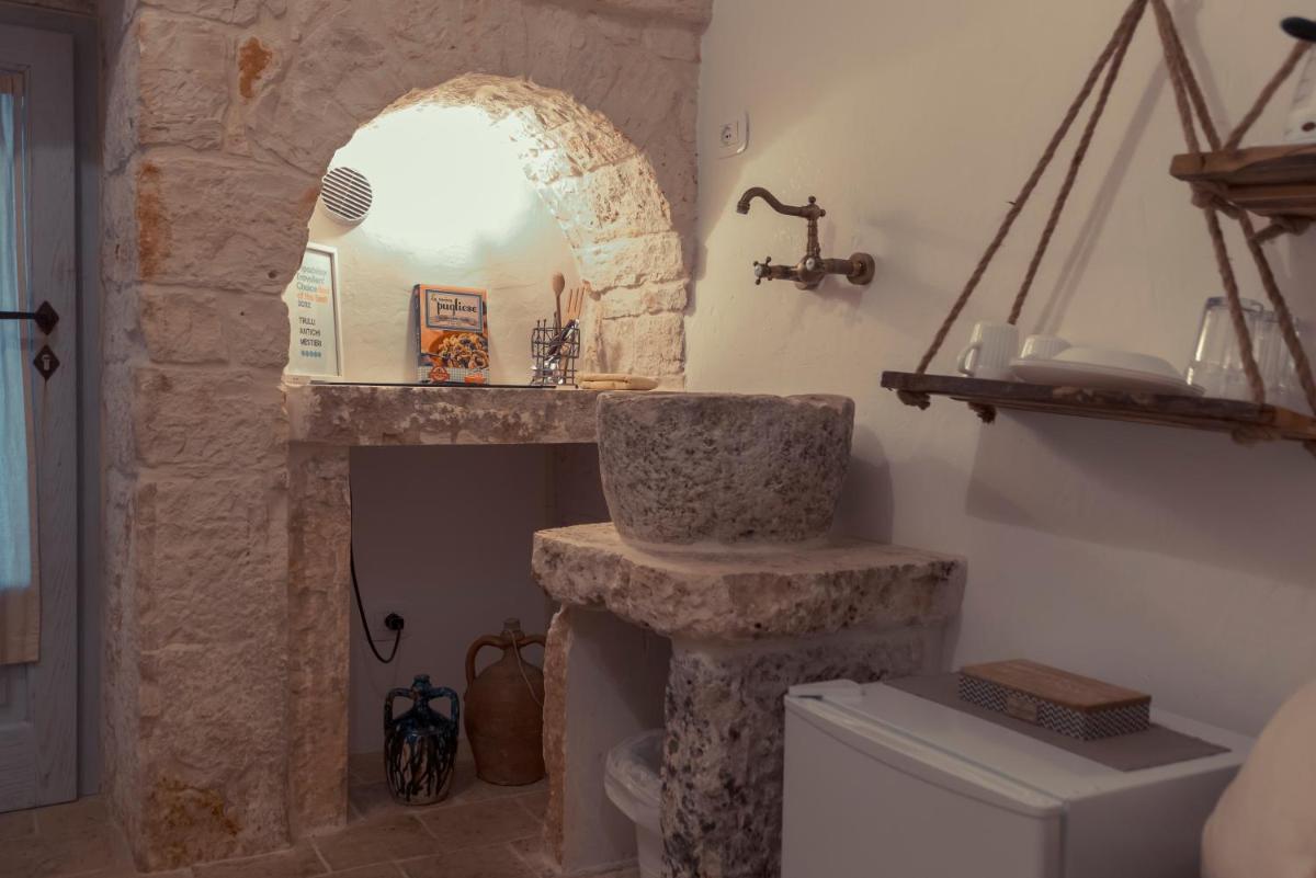 Trulli diffusi de La Corte dell'Astore I Trulli Antichi Mestieri