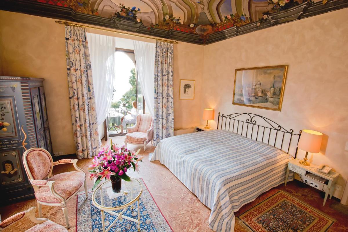 Hotel Castello Seeschloss, lake & pool castle