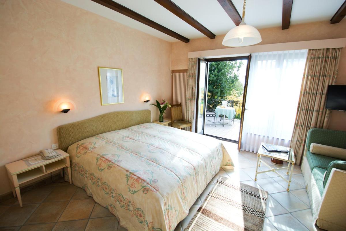 Hotel Castello Seeschloss, lake & pool castle