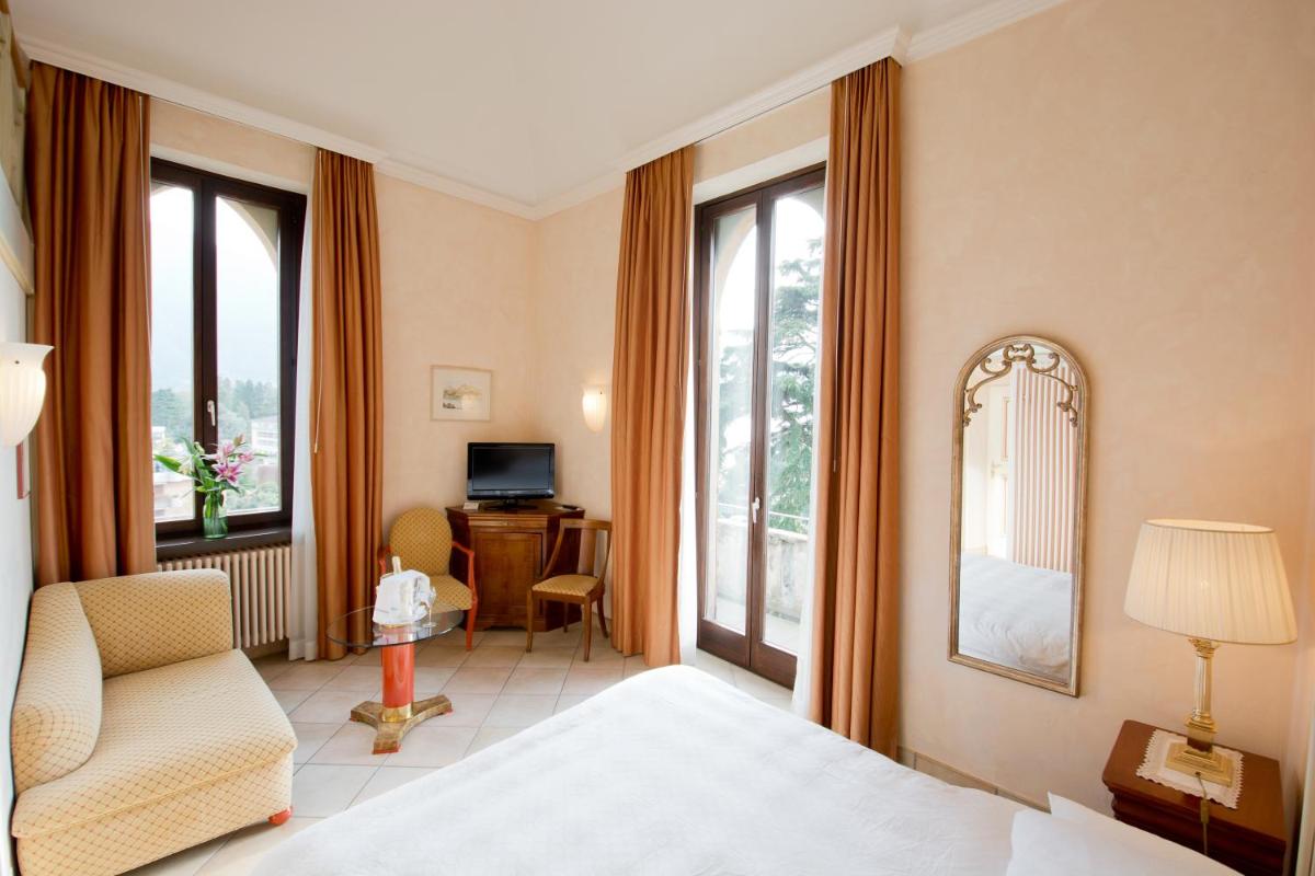 Hotel Castello Seeschloss, lake & pool castle